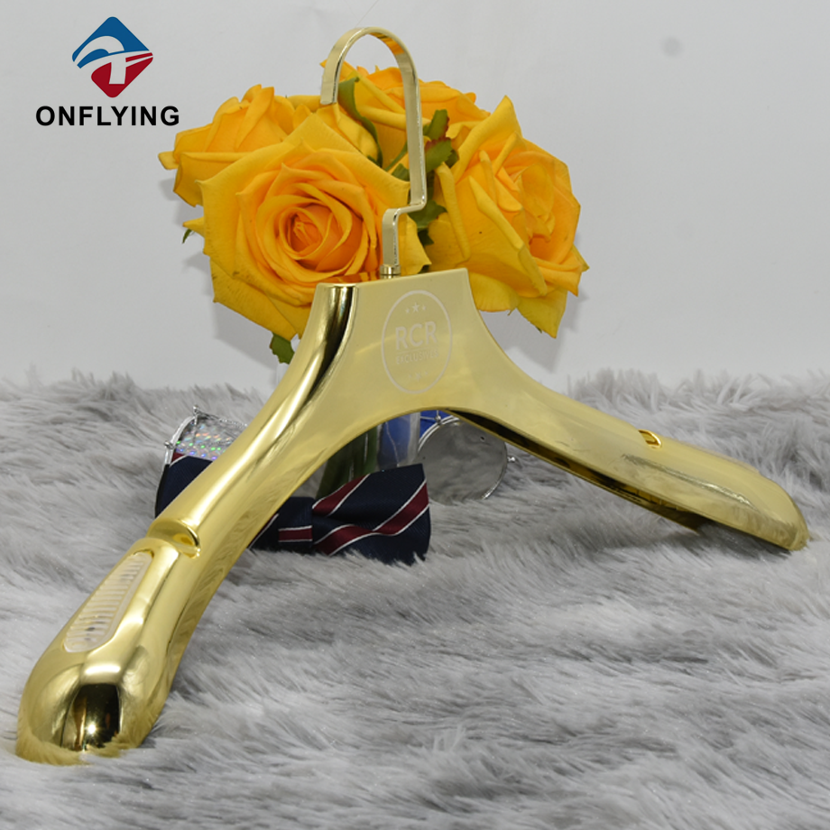 Hangage en plastique électroplié en or durable haut de gamme pour placard chinois Factory