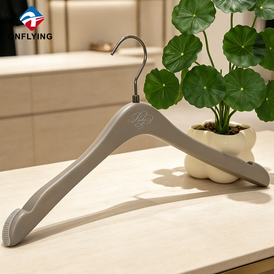 Hot-selling Engraved logo Anti-slip Rubber Shoulder Beech Wooden Clothing Hanger Factory China