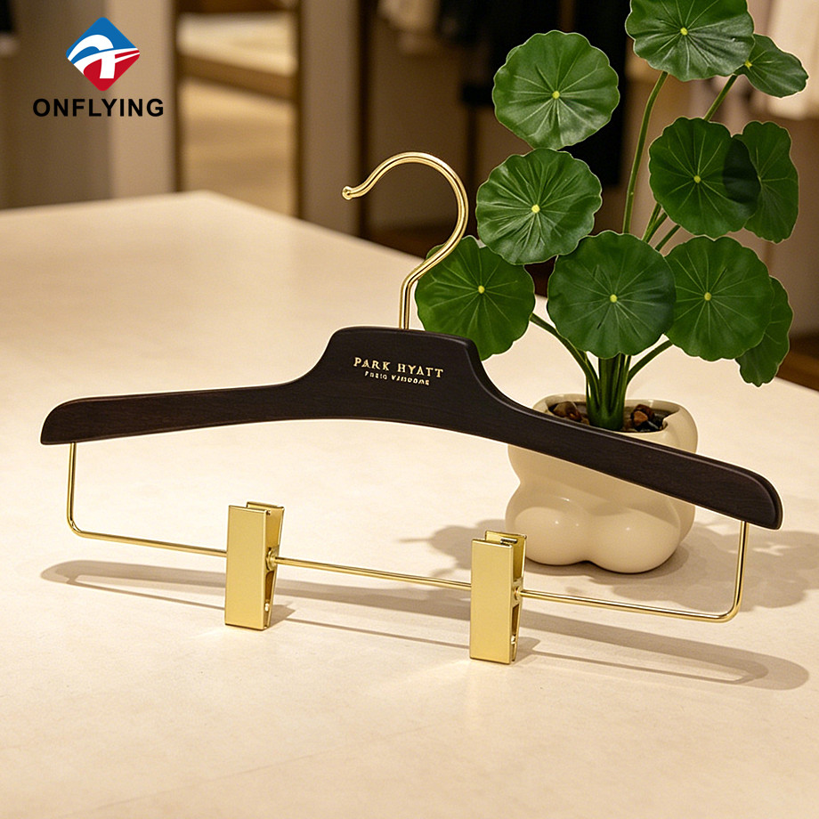 Premium Clothes Boutique Engraved logo Custom Beech Wood Pants Hanger with Clips Supplier China - COPY - cb3de8