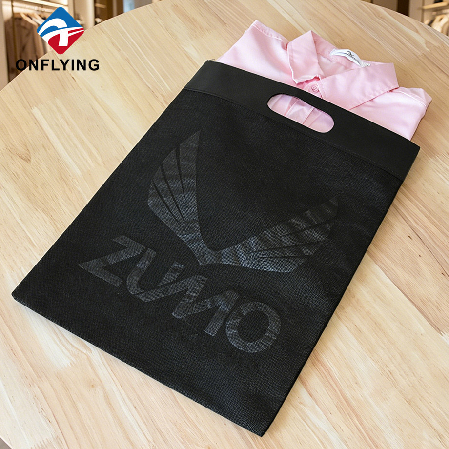 Sac à poignée de poinçon coupé de vêtement non tissé stratifié imperméable épaissi, logo personnalisé usine Chine