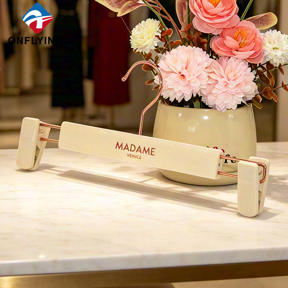 Elegant Boutique Hot-stamping logo Custom Beige Flocked Velvet Pants Hanger Supplier China
