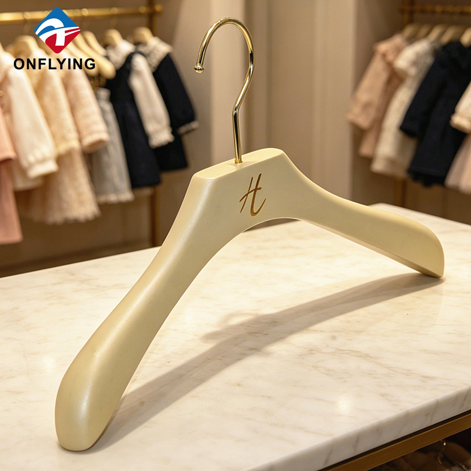 High-end Luxurious Wood Solid Smooth Garment Kid Wooden Beige Hanger Custom logo Factory China