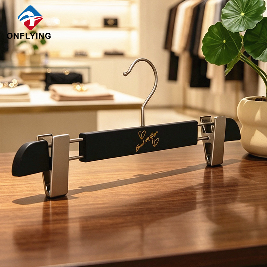 High Quality Versatile Multi-purpose Black Wooden Men's Pants Hangers with Clips Supplier China