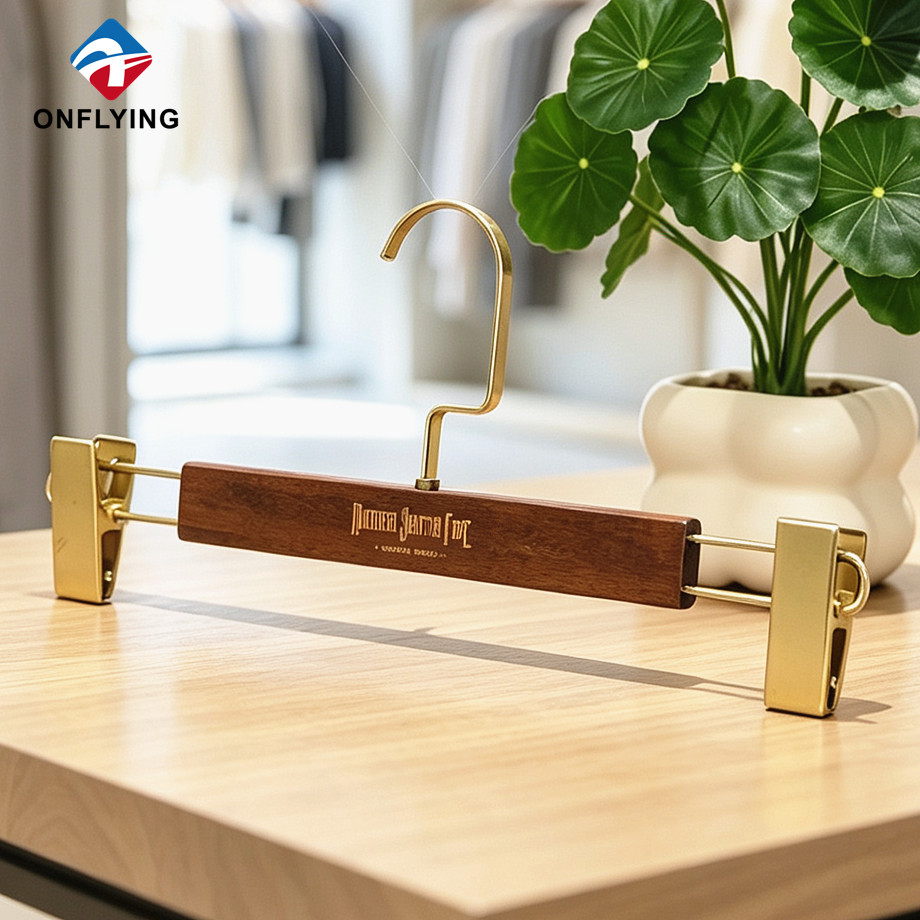 High Quality Versatile Multi-purpose Black Wooden Men's Pants Hangers with Clips Supplier China