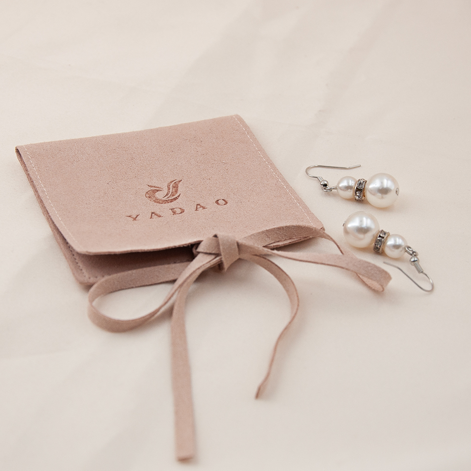 Popular nude color pouch with string