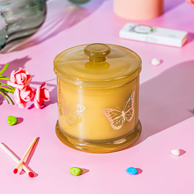 جرة زجاجية على شكل شمعة بختم ساخن على شكل فراشة مع غطاء