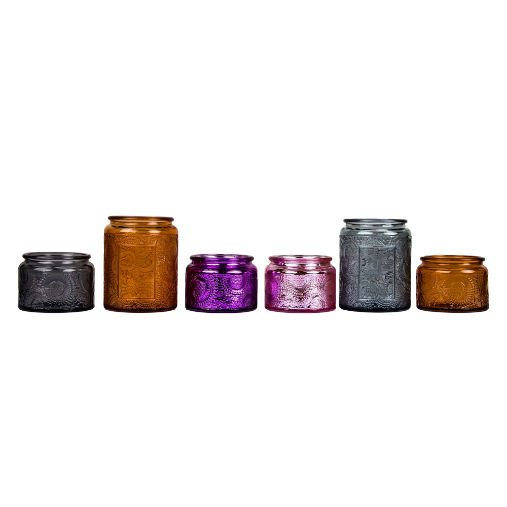 Frasco de vela âmbar Boticário com tampa de lata para velas perfumadas