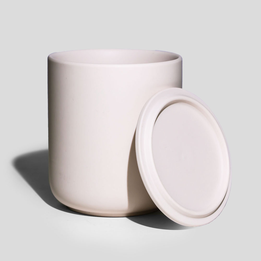 Elegante vaso de vela de cerámica con rubor nórdico