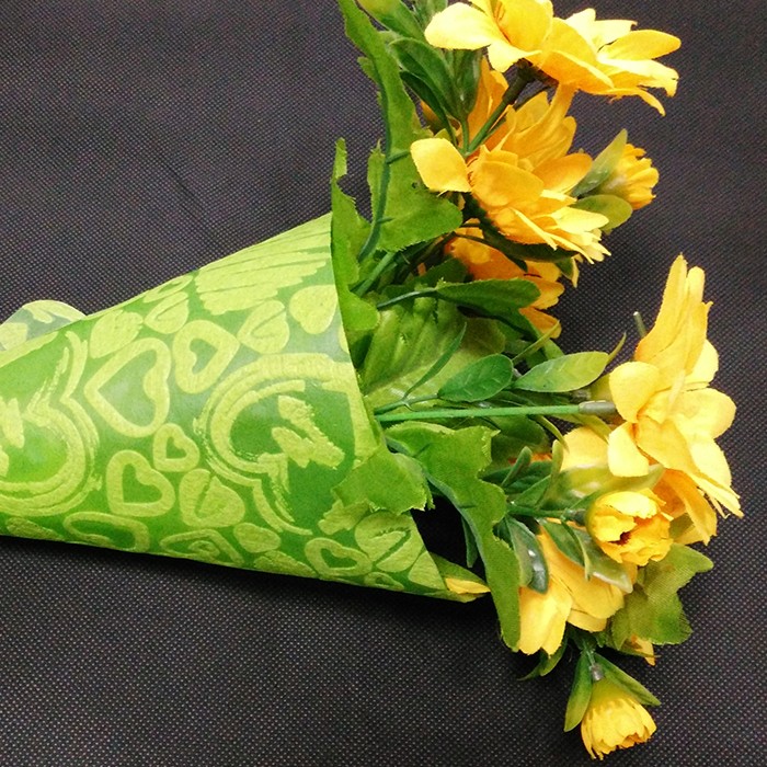 China Atacado Fábrica de embrulho de flores coloridas em relevo em relevo não tecido Fábrica de embrulho de flores fabricante Atacado Fábrica de embrulho de flores coloridas em relevo em relevo não tecido Fábrica de embrulho de flores