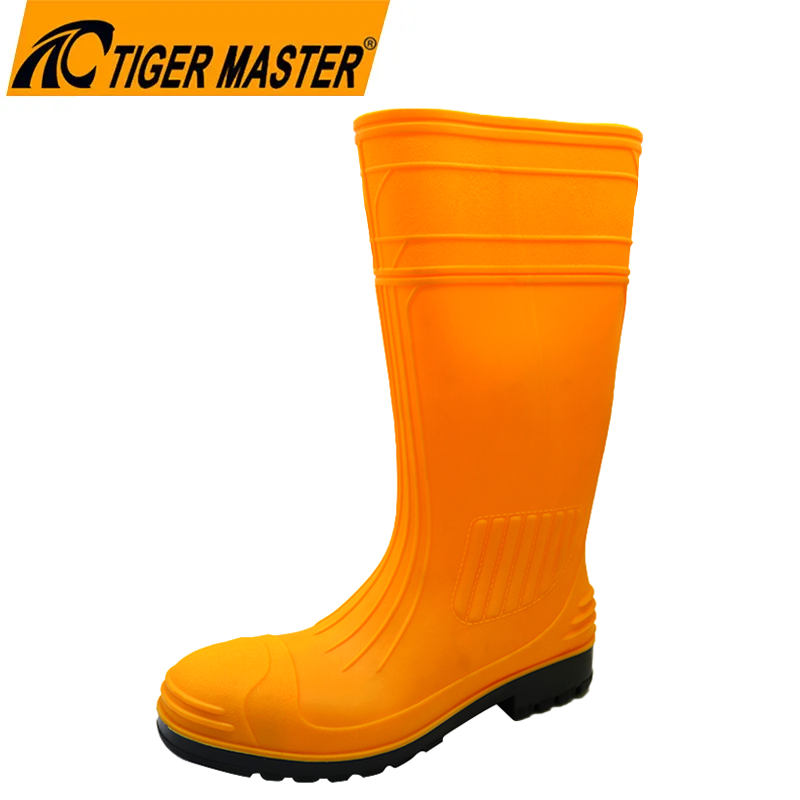 Botas hasta la rodilla de PVC de seguridad impermeables de color naranja GB38 para construcción