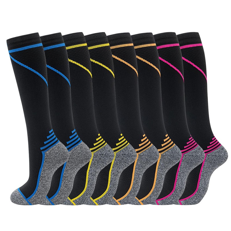 Chine Chaussettes hautes aux genoux en gros en Chine, chaussettes de compression athlétiques hautes aux genoux personnalisées fabricant