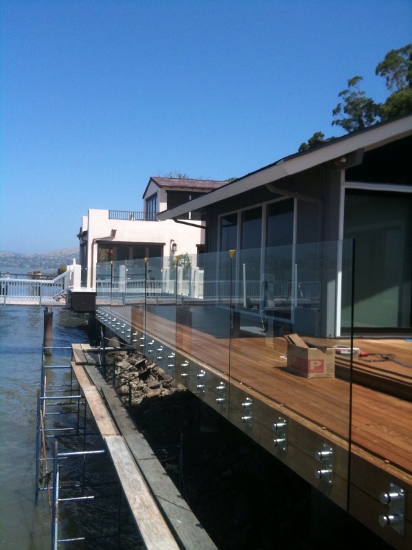 Glass standoff for frameless glass staircase balcony