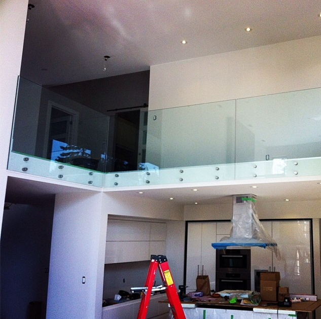 frameless glass balustrade with stainless steel standoffs