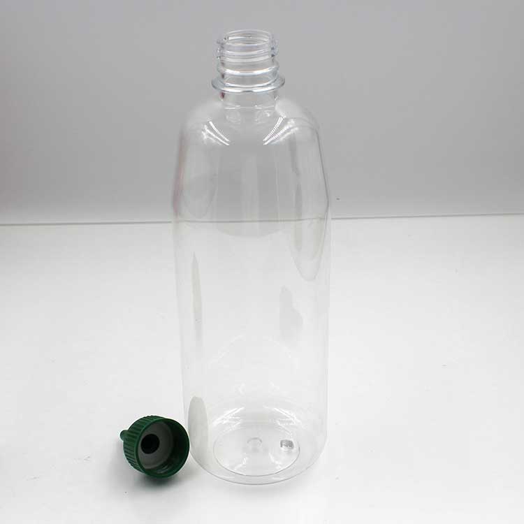 clear empty 750ml sauce bottle