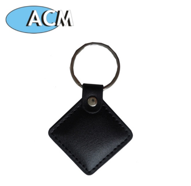 تتفاعل شعار طباعة Pu 13.56mhz Nfc الراقي Keyfob تنقش الجلود المخصصة المفاتيح