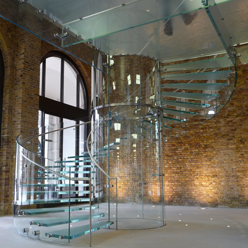 Trapezoidal safety stair railing glass manufacturer, spiral stair railing curved glass supplier