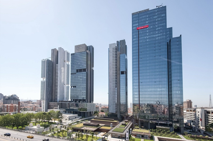 What type of safety laminated insulated glass is used in high-rise buildings?