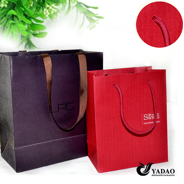 2014 newest paper jewelry packaging bag with print logo for shopping China manufacturer