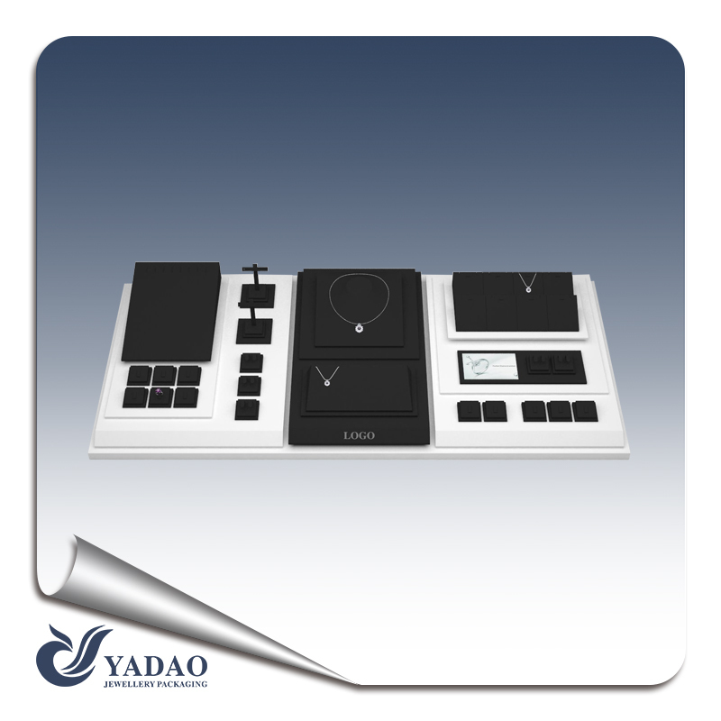 Factory price of economic Luxury but simple black and white acrylic jewelry holder ,jewelry exhibitor stand ,jewellery presentation props with custom logo