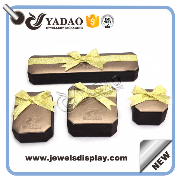 High end leather covered plastic jewelry box with drawstring and logo made in China