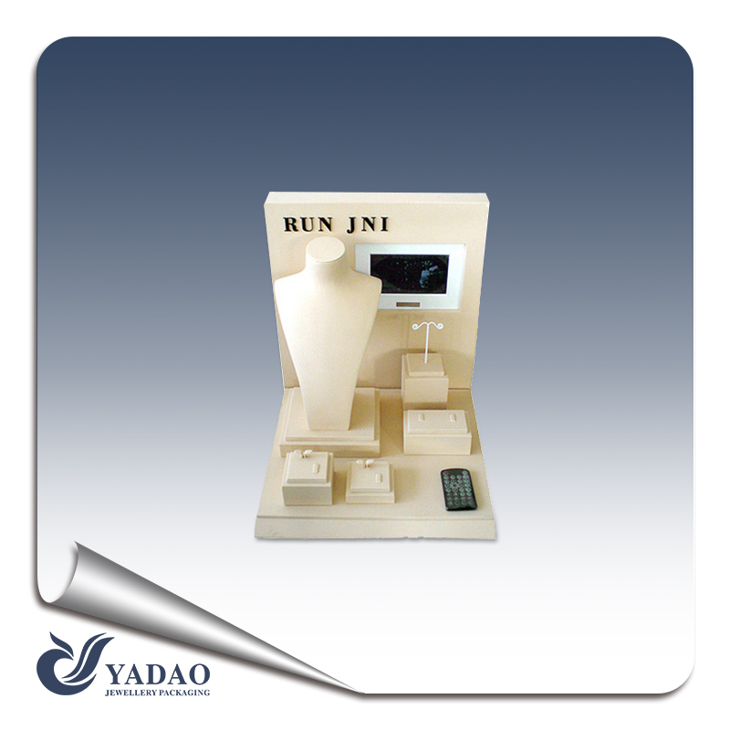 Wooden pu leather jewelry display sets containing one standing bust and a few earrring and pendant display sets of LED displays