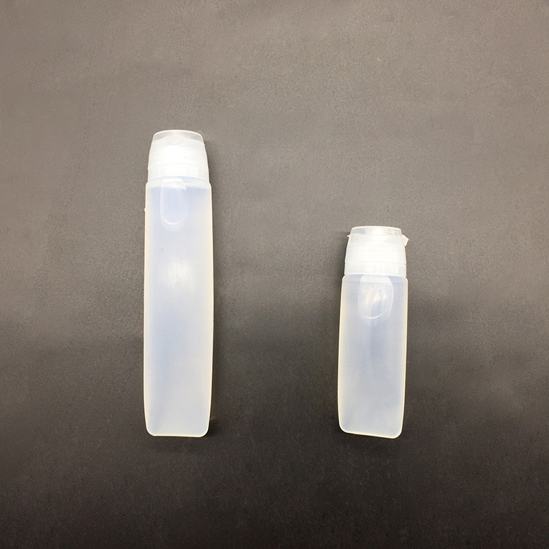 Tubo da viaggio in silicone per uso alimentare diretto in fabbrica, pratico contenitore con coperchio di tenuta