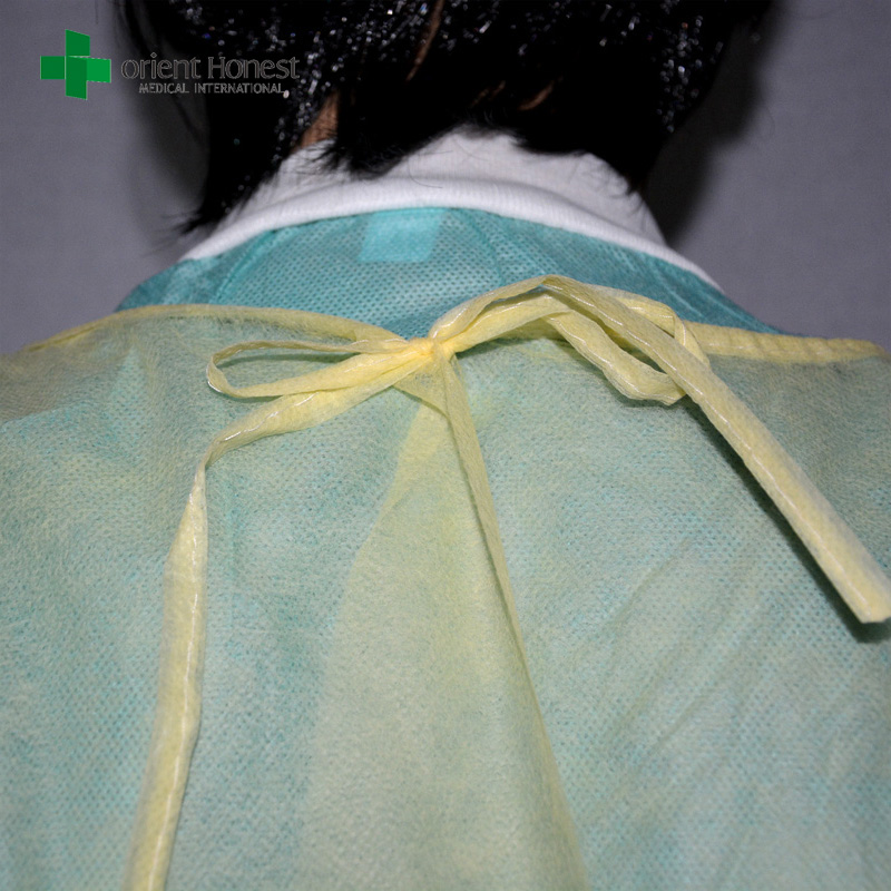 disposable isolation gown, yellow disposable isolation gown wholesales,pp non woven isloation gown suppliers