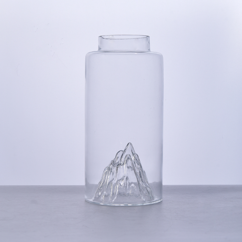 Unique large glass bottle with mountain design bottom 