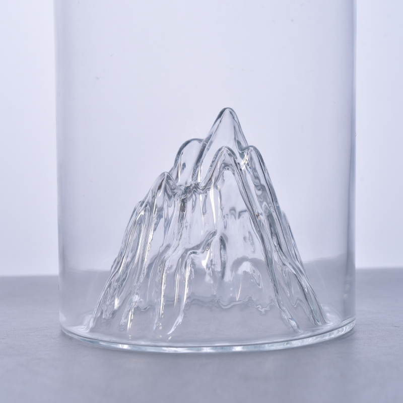 Unique large glass bottle with mountain design bottom 