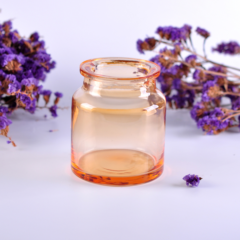 Amber color glass candle jar