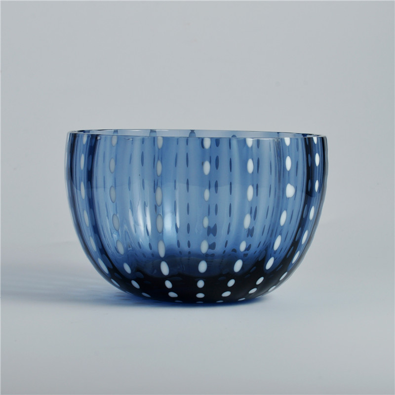 Blue solid glass candle container