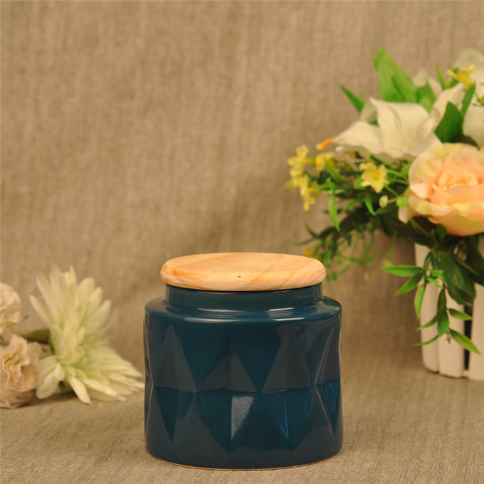 Ceramic candle holder with wood lids