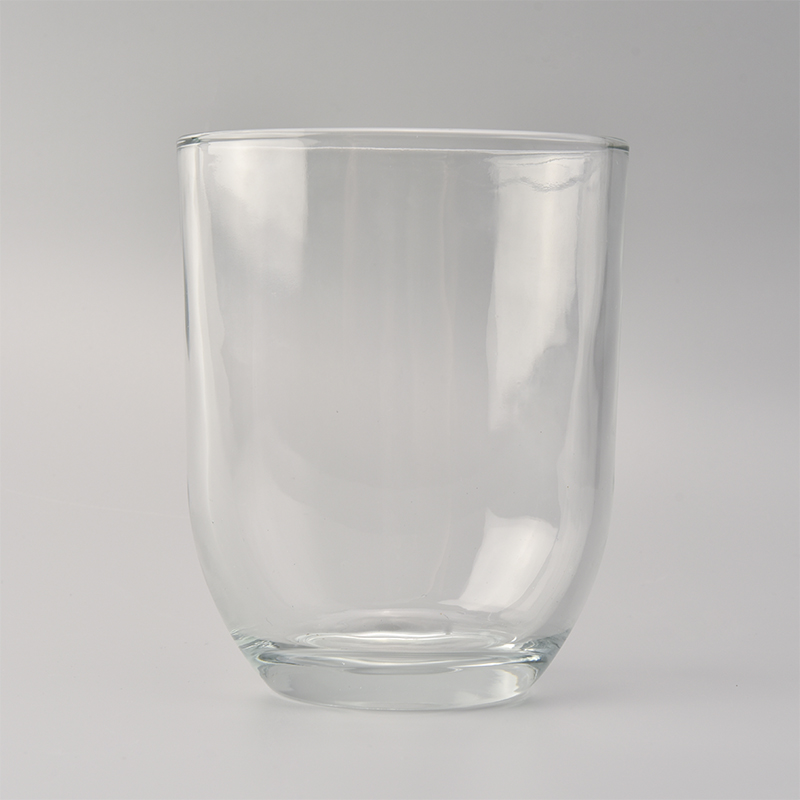 Elliptical transparent glass candle holder