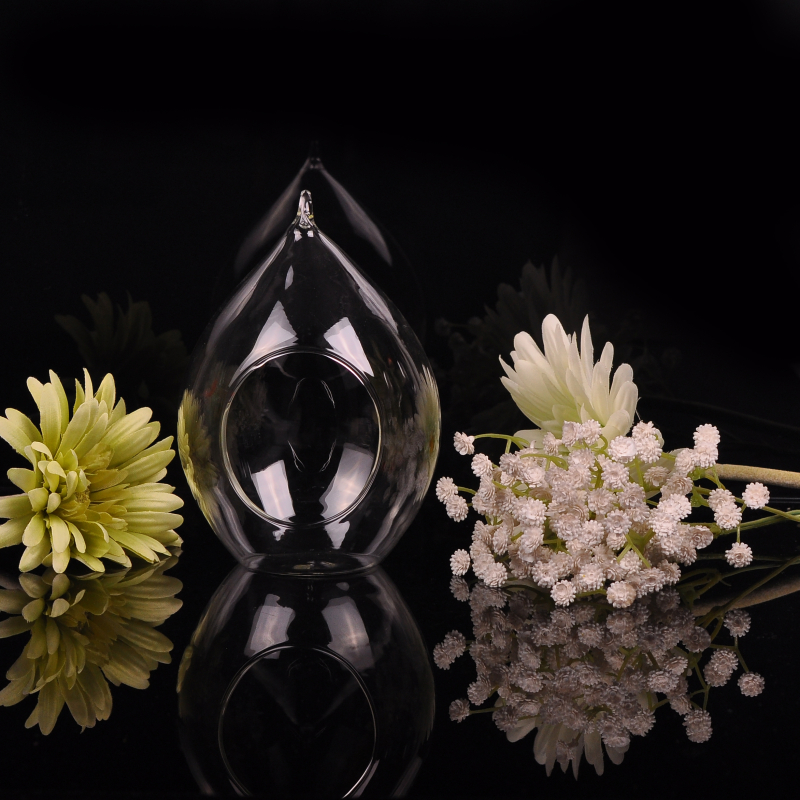 Bola de cristal colgando portacandelitas