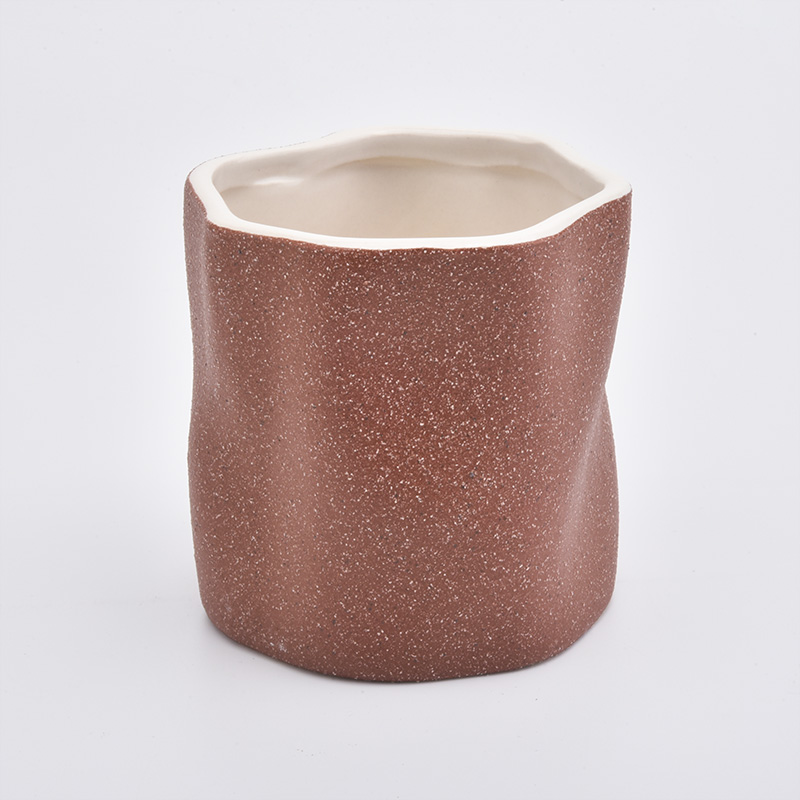 Unique shape ceramic candle holder with sanding surface finish