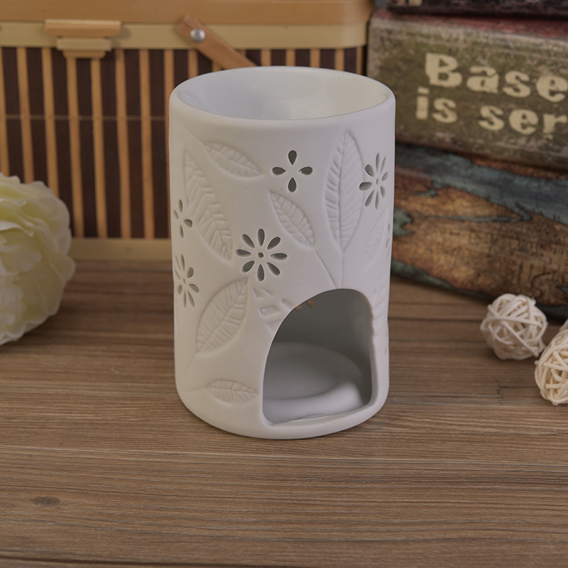 Folhas brancas queimador de vela cerâmico debossed