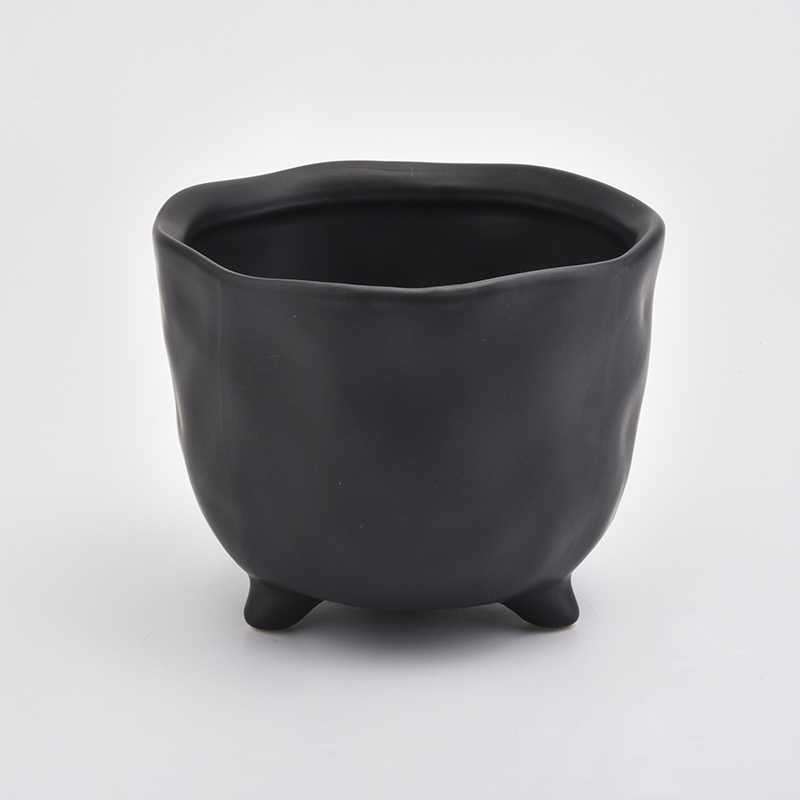 footed matte black ceramic jar