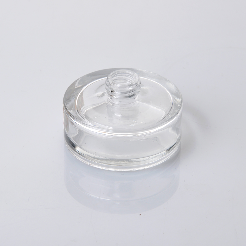 shot round glass perfume bottle