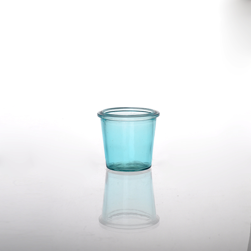 spraying color glass candle jar
