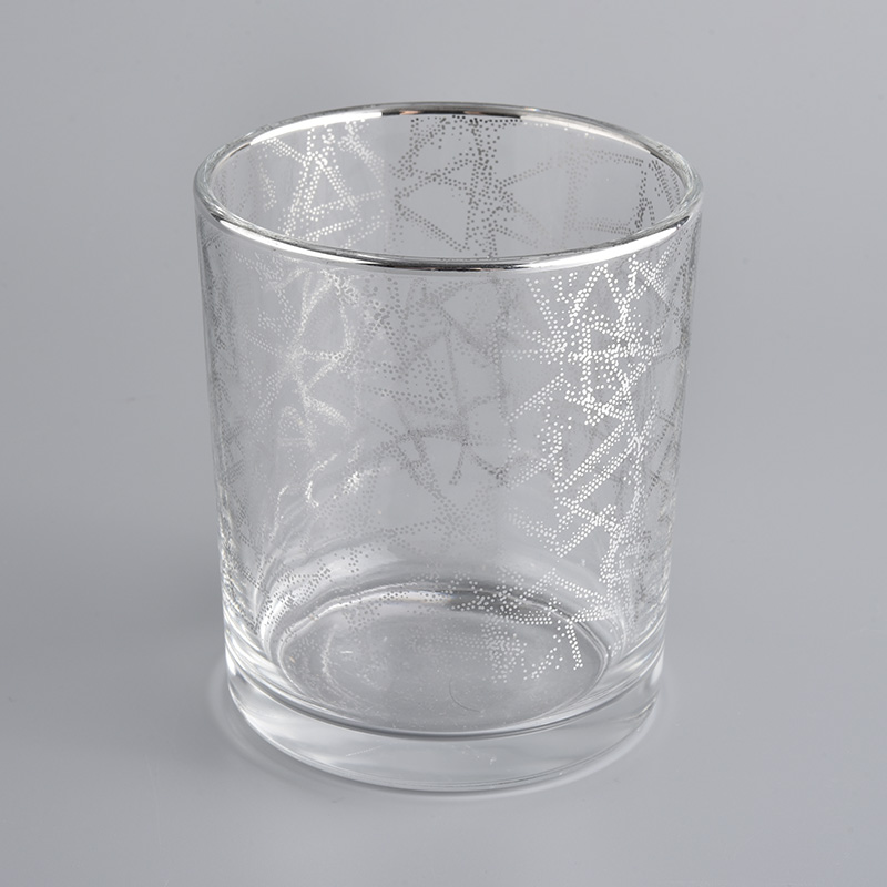 transparent glass candle jar with silver shiny patterns