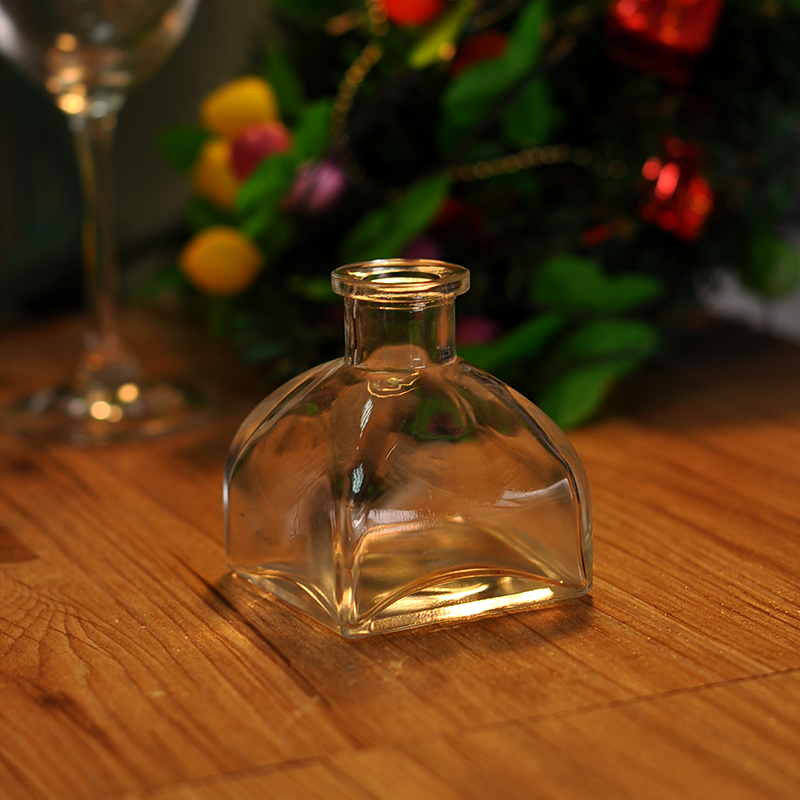 transparent perfume bottle with tent shape