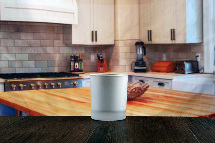 Small glass cylinder candle holder