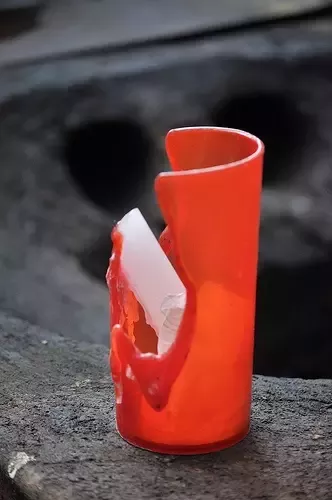 Why should you not make candle holders out of flammable material?