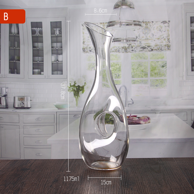 Clear glass decanter with handle