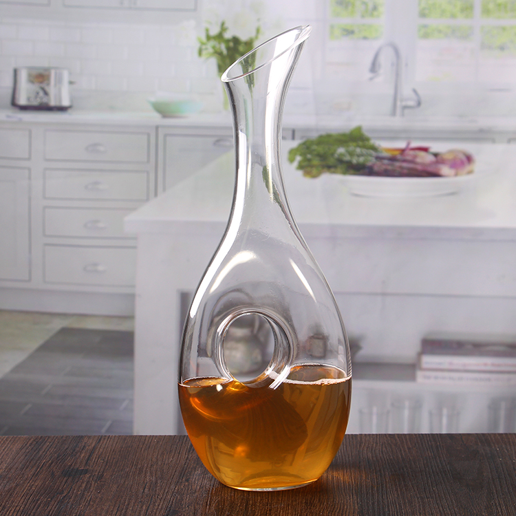 Clear glass decanter with handle