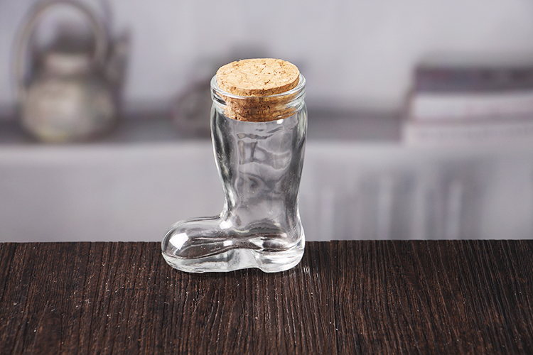 Boot shaped glass bottle