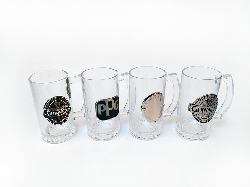 beer glass with metal logo