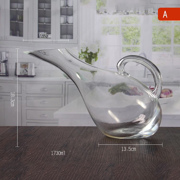Clear glass decanter with handle