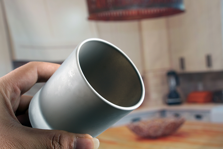 Small glass cylinder candle holder