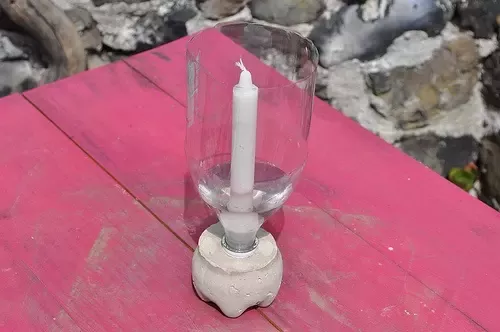 Why should you not make candle holders out of flammable material?